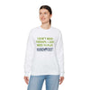 Unisex Heavy Blend Crewneck Sweatshirt with 'I Don't Need Therapy, I Just Need to Play Hand & Foot' text, worn by model.