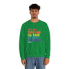 Model wearing green It's My Turn Unisex Heavy Blend Crewneck Sweatshirt with colorful text, ideal for relaxed style and comfort.
