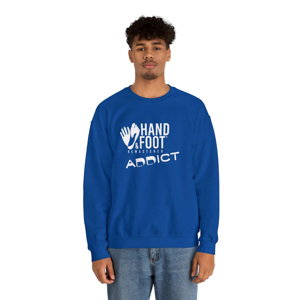 Unisex blue crewneck sweatshirt with 'Hand & Foot Addict' design, worn by a person. Comfortable and sustainable fashion.