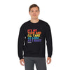 Model wearing 'It's My Turn' Unisex Heavy Blend Crewneck Sweatshirt, black with colorful text, perfect for casual wear.