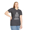 Person wearing a Keep Calm Softstyle T-Shirt with 'Keep Calm and Play Hand & Foot' slogan, made from 100% ring-spun cotton.