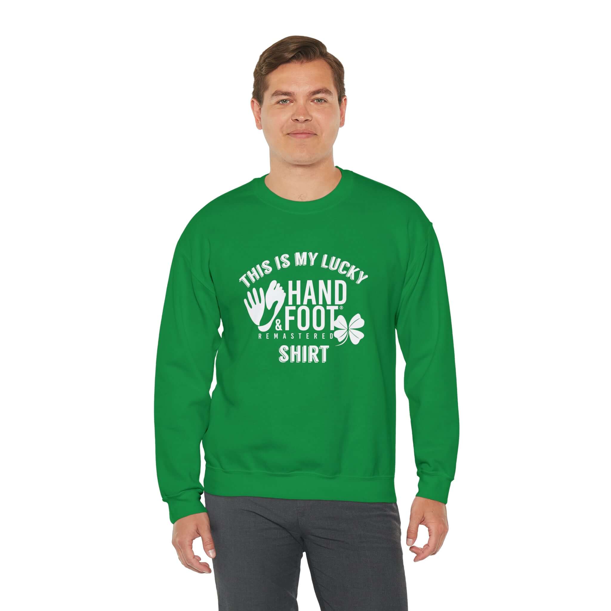 Man wearing a green Lucky Unisex Heavy Blend Crewneck Sweatshirt with 'This is My Lucky Hand & Foot Shirt' text printed on it.