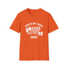 Orange Lucky Softstyle T-Shirt with "This is my lucky Hand & Foot remastered shirt" print; made of 100% ring-spun cotton.