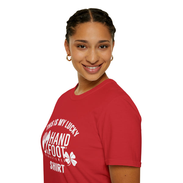 Smiling person wearing a red Lucky Softstyle T-Shirt made from 100% ring-spun cotton, showcasing comfort and style.