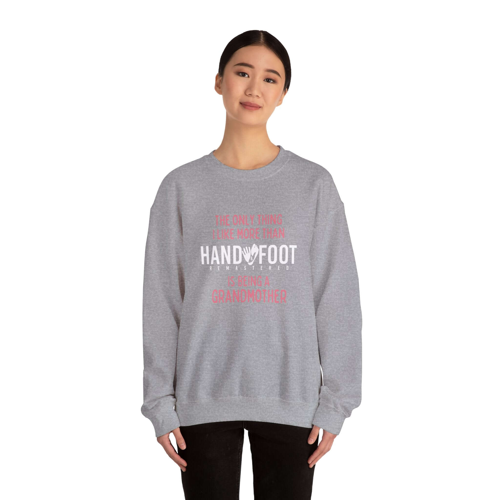 Woman wearing Being a Grandmother Unisex Heavy Blend Crewneck Sweatshirt, perfect gift for grandmothers, cozy and stylish.