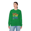 Model wearing green 'It's My Turn' unisex crewneck sweatshirt with colorful text print, perfect for board game enthusiasts.