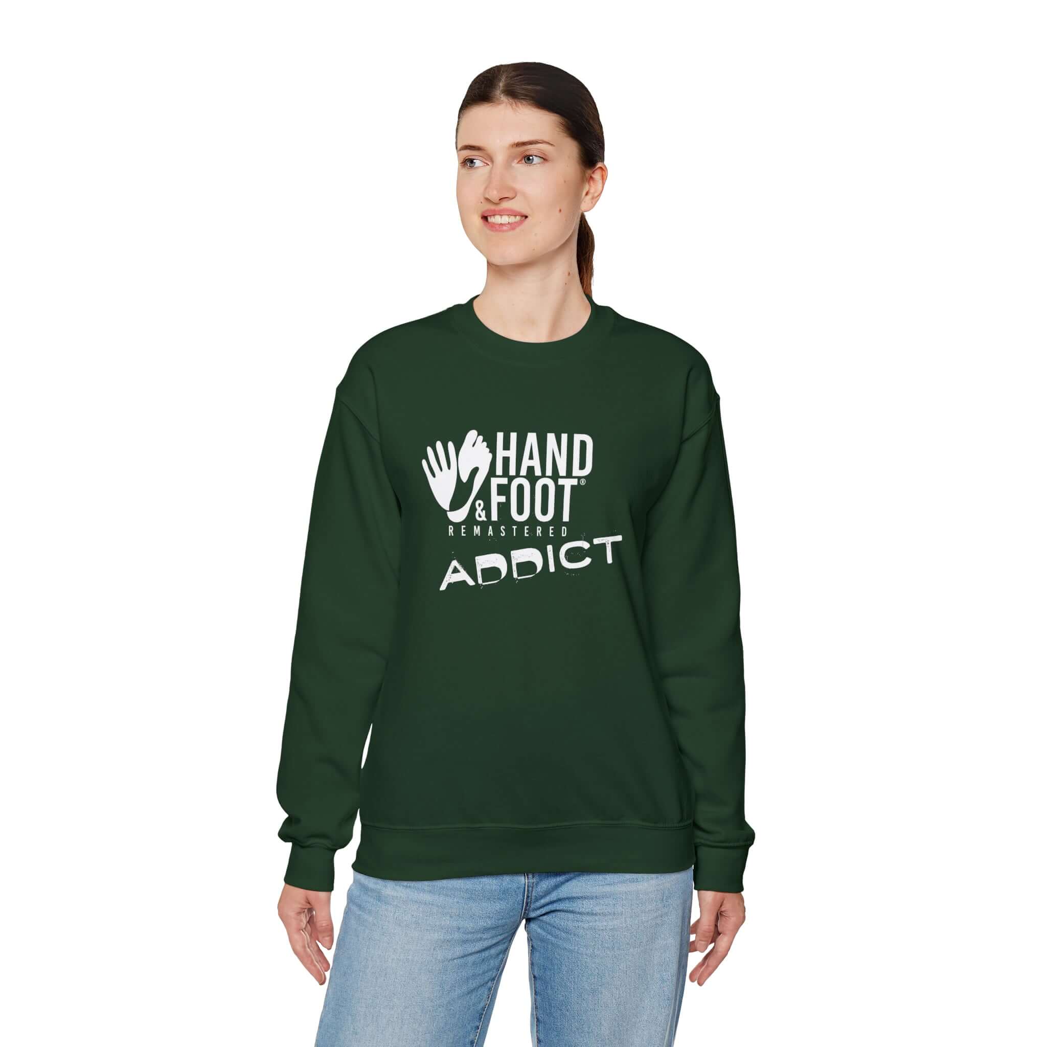 Woman wearing Hand & Foot Addict unisex heavy blend crewneck sweatshirt in green, showcasing cozy and sustainable fashion.