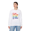 Person wearing 'It's My Turn' unisex heavy blend crewneck sweatshirt with colorful text.