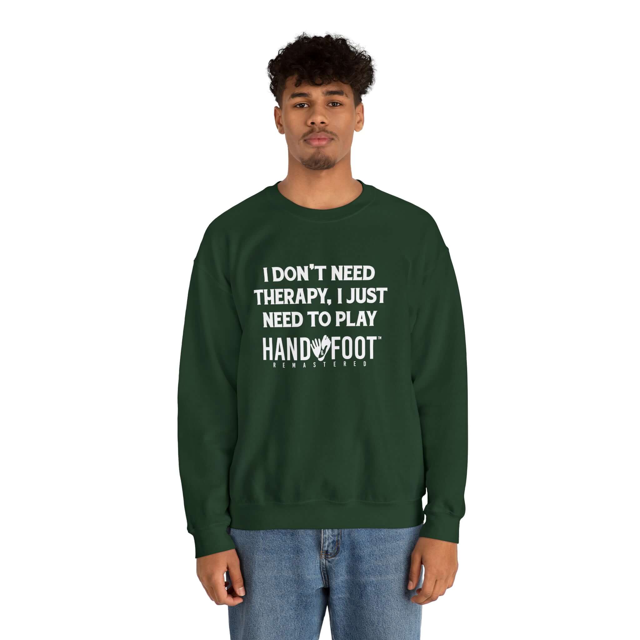 Green unisex crewneck sweatshirt with 'I Don't Need Therapy, I Just Need to Play Hand & Foot' text, modeled by person.