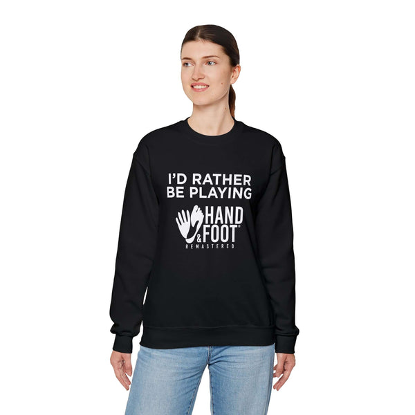 Model wearing 'I'd Rather Be Playing Hand & Foot Remastered' black crewneck sweatshirt, showcasing design and comfort.