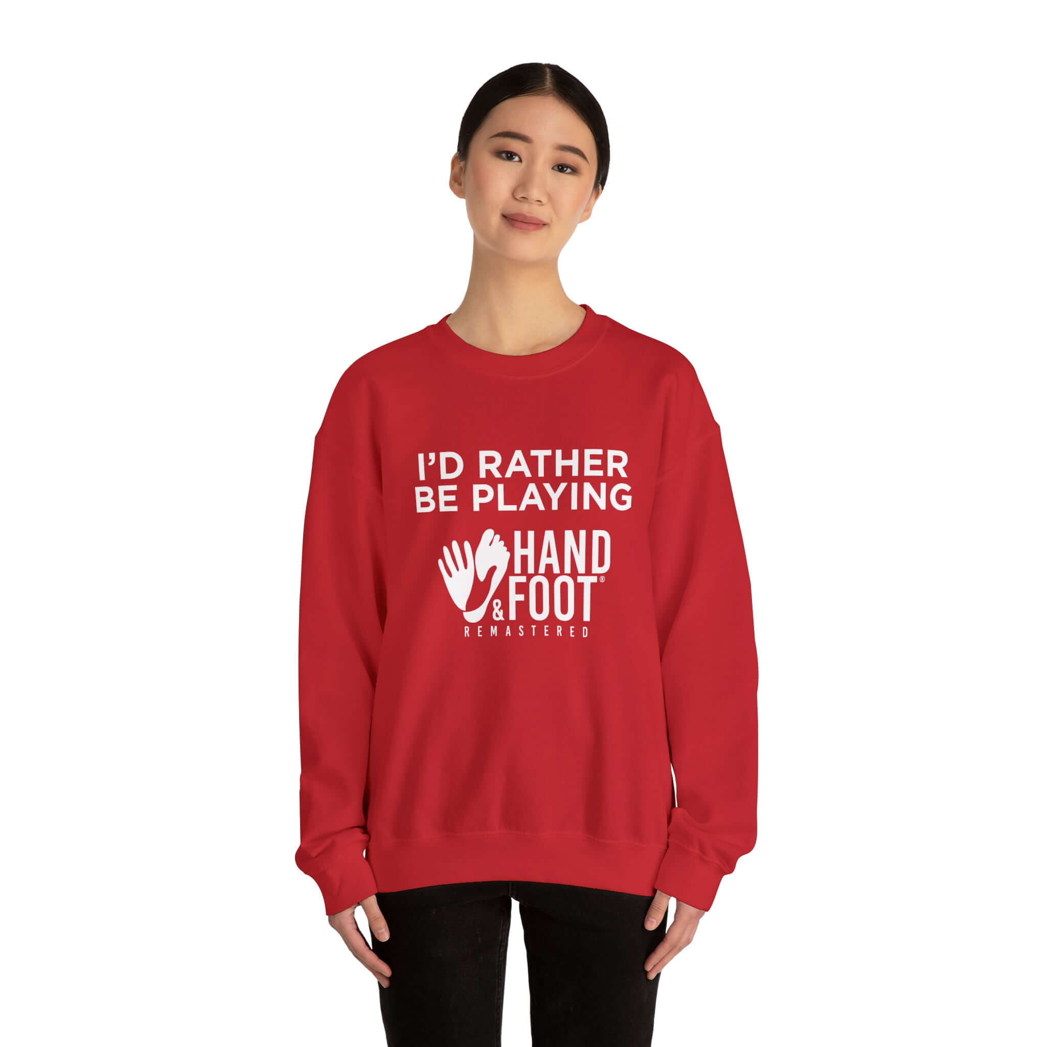 Model wearing red 'I'd Rather Be Playing' unisex heavy blend crewneck sweatshirt with white lettering.