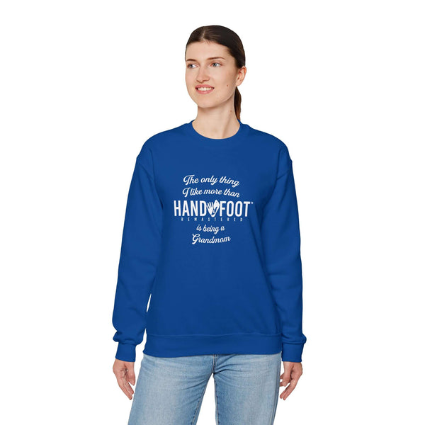 Woman wearing Being a Grandmom unisex crewneck sweatshirt in blue, featuring a cozy and sustainable design perfect for any Grandmother.