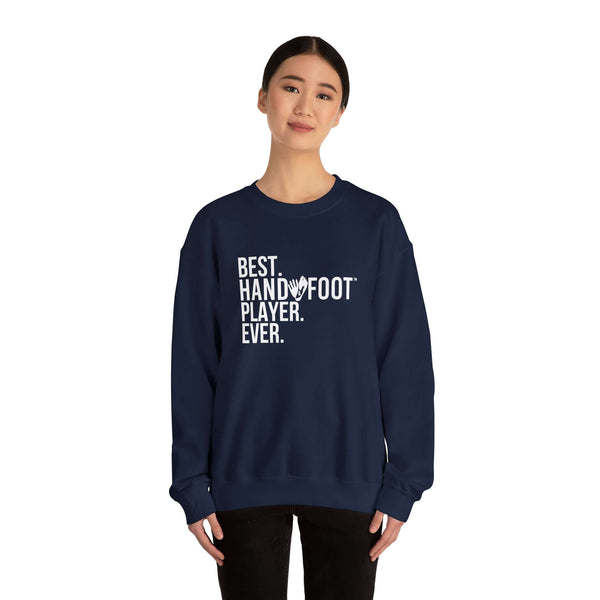 Model wearing Best Hand Foot Player Ever unisex navy sweatshirt, comfortable and sustainable fashion.