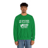 Green unisex crewneck sweatshirt with 'I'd Rather Be Playing Hand & Foot Remastered' graphic text displayed by a model.