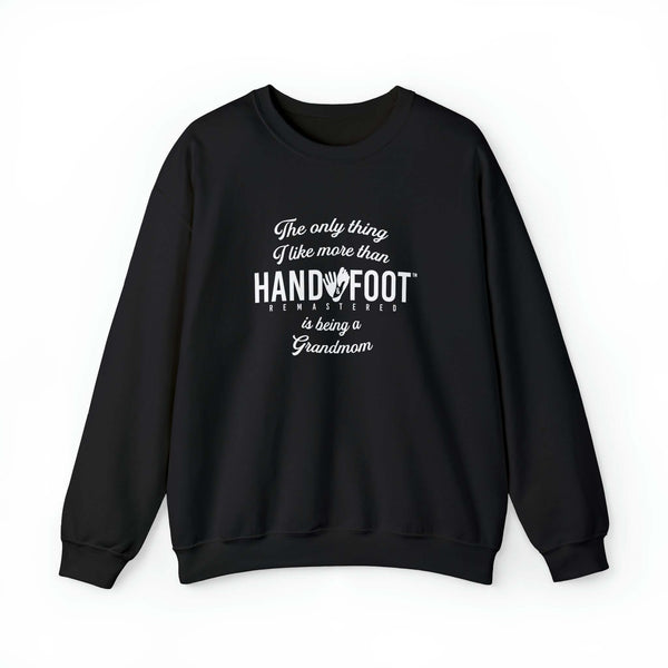 Black "Being a Grandmom" unisex crewneck sweatshirt with hand and foot lettering design, perfect cozy gift for grandmothers.