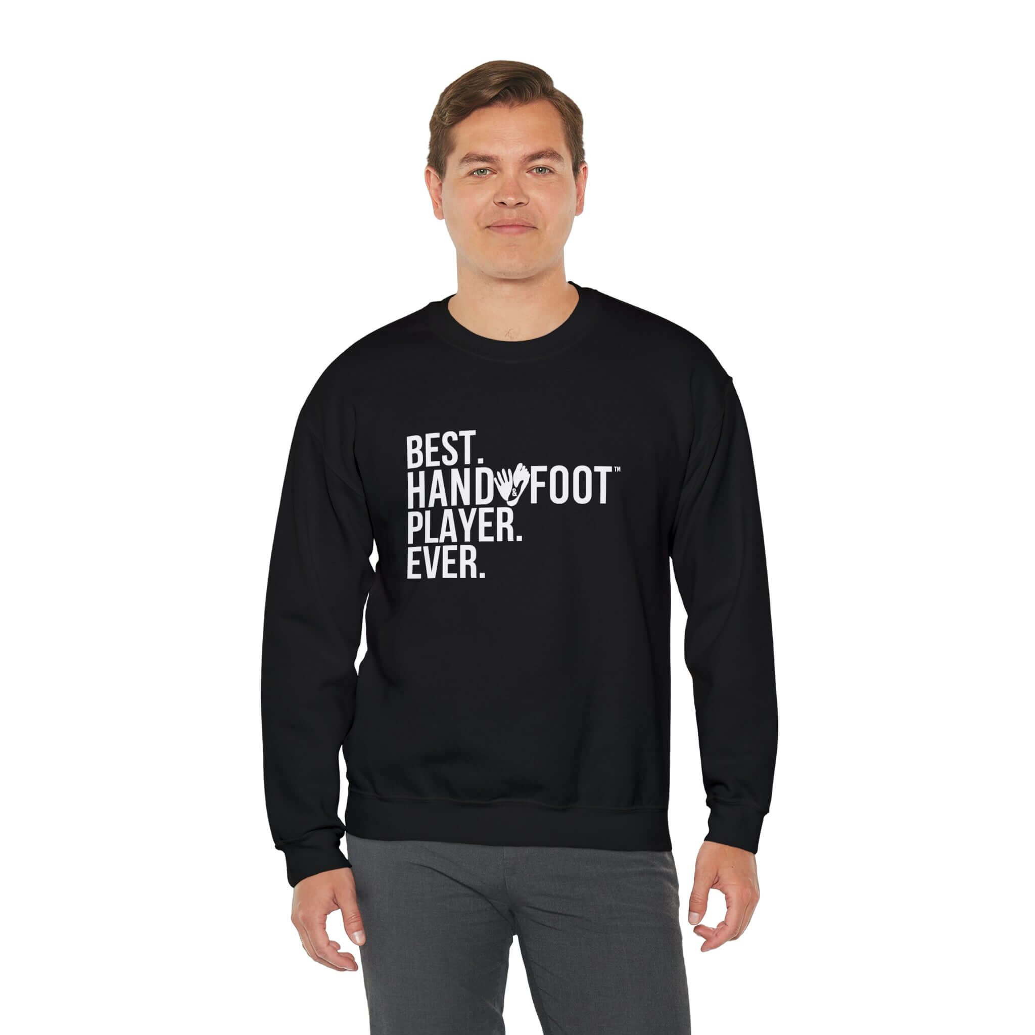 Man wearing a 'Best Hand Foot Player Ever' unisex heavy blend crewneck sweatshirt, emphasizing comfort and sustainable fashion.