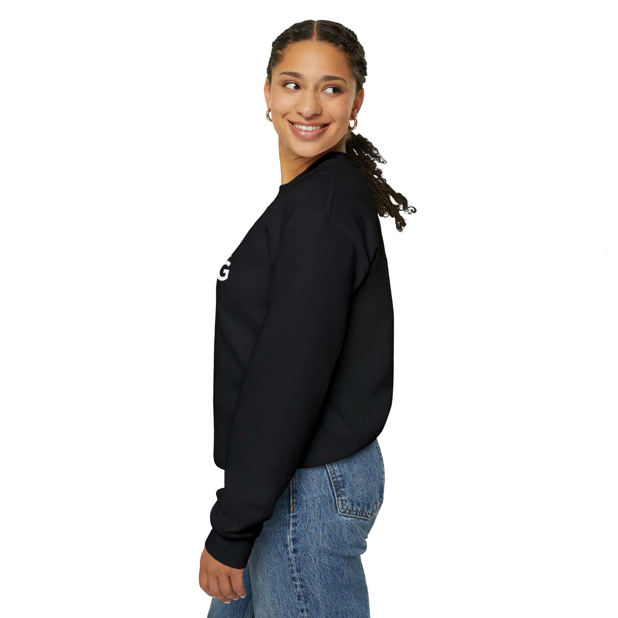 Unisex Heavy Blend Crewneck Sweatshirt in black worn by a smiling person, showcasing comfort and style.