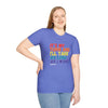 Woman wearing blue 'It's My Turn' Softstyle T-Shirt made of 100% ring-spun cotton, unisex design.