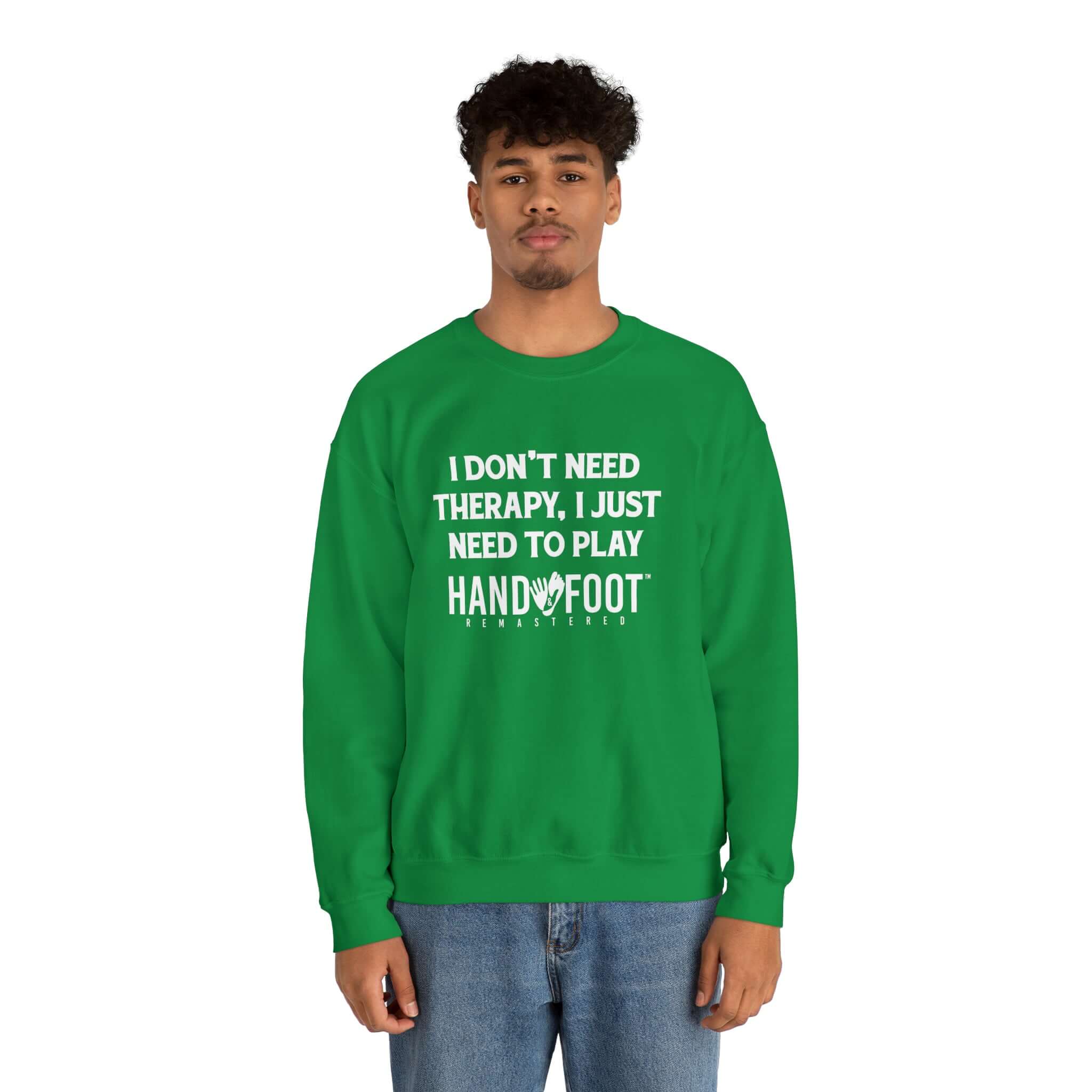 Model wearing Therapy Unisex Heavy Blend Crewneck Sweatshirt in green with Hand & Foot Remastered slogan