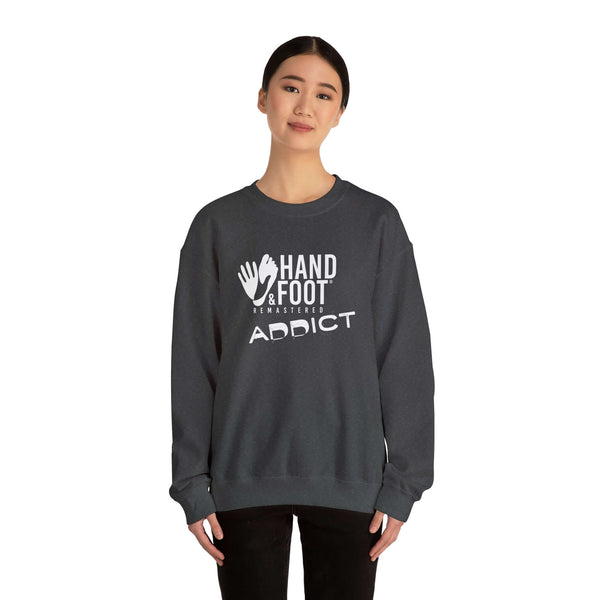 Unisex Hand & Foot Addict Crewneck Sweatshirt in charcoal worn by model, showcasing cozy comfort and sustainable fashion.