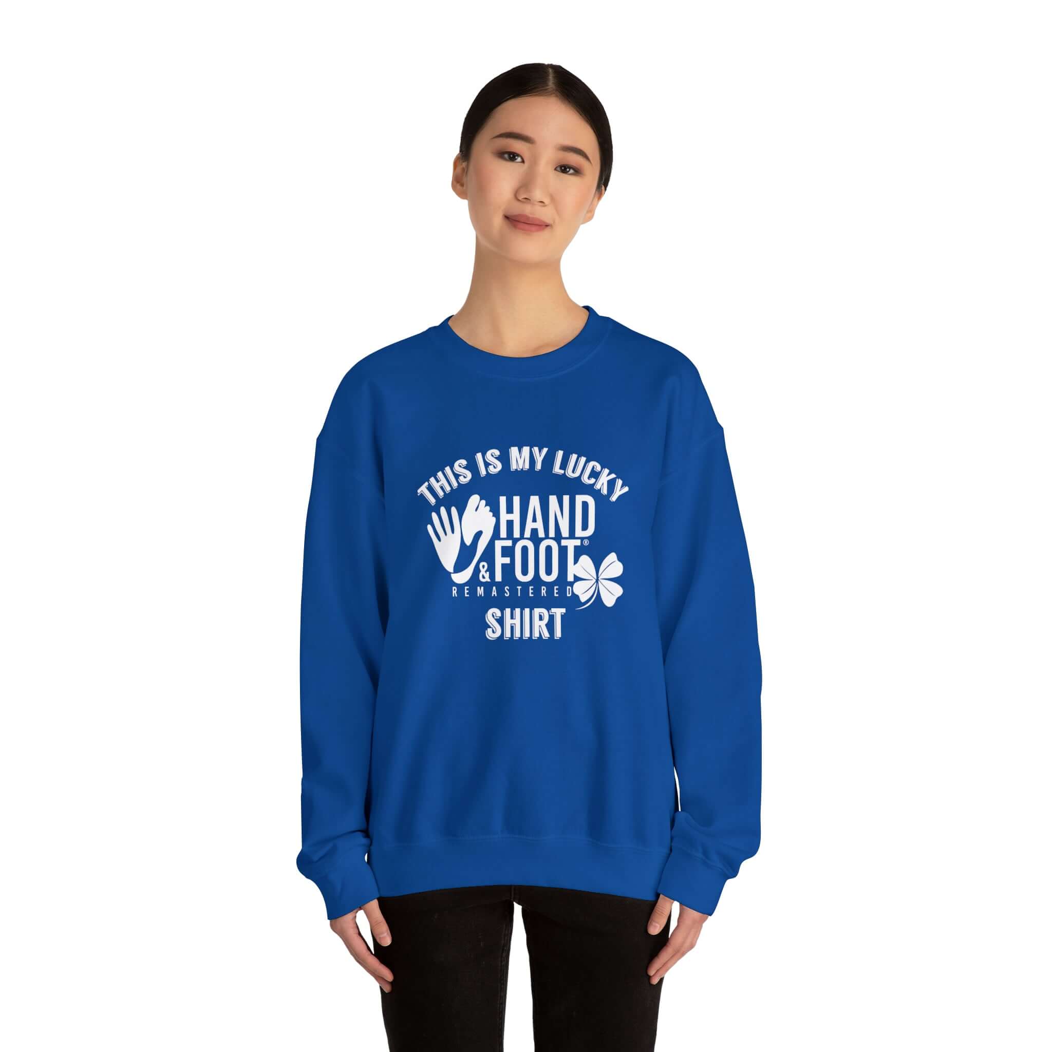 Model wearing Lucky Unisex Heavy Blend Crewneck Sweatshirt in blue with 'This is my lucky hand & foot' text design