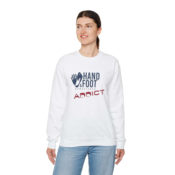Person wearing Hand & Foot Addict unisex crewneck sweatshirt featuring cozy design in white color.