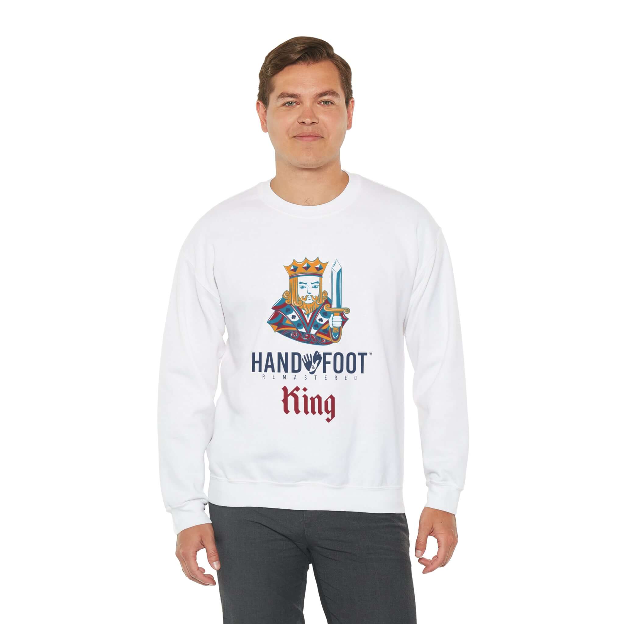 Unisex heavy blend crewneck sweatshirt with 'Hand & Foot King' logo, worn by a model. Perfect for comfort and sustainability.