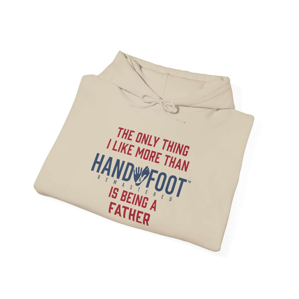 Beige "Being a Father" hooded sweatshirt with playful message, featuring adjustable drawstring and warm kangaroo pocket.