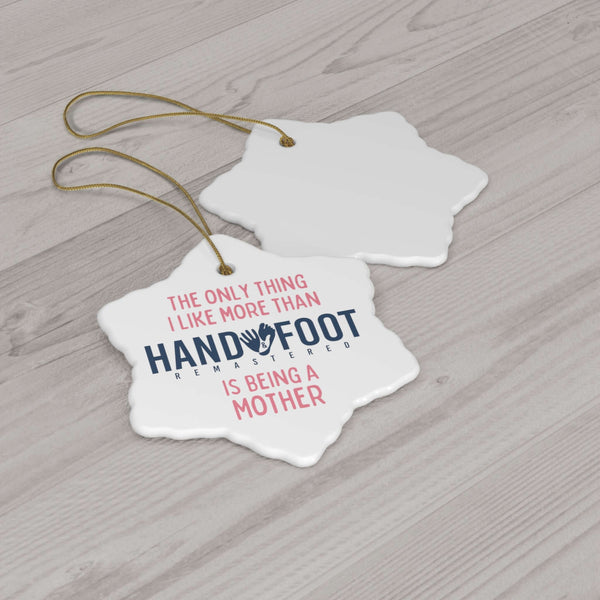 Star-shaped ceramic ornament featuring 'Being a Mother' message with gold hanging string, perfect for holiday decor.