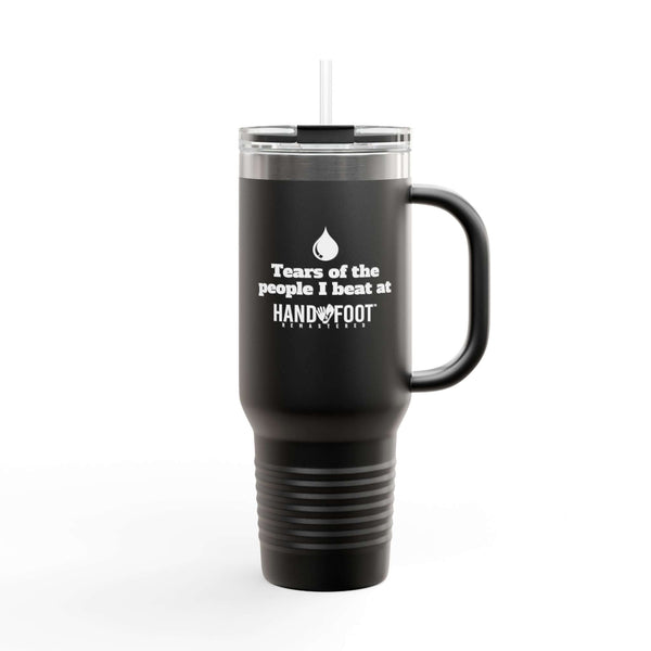 Black 40oz insulated travel mug with humorous text 'Tears of the people I beat at hand and foot.' Ergonomic handle, ideal for hot or cold drinks.