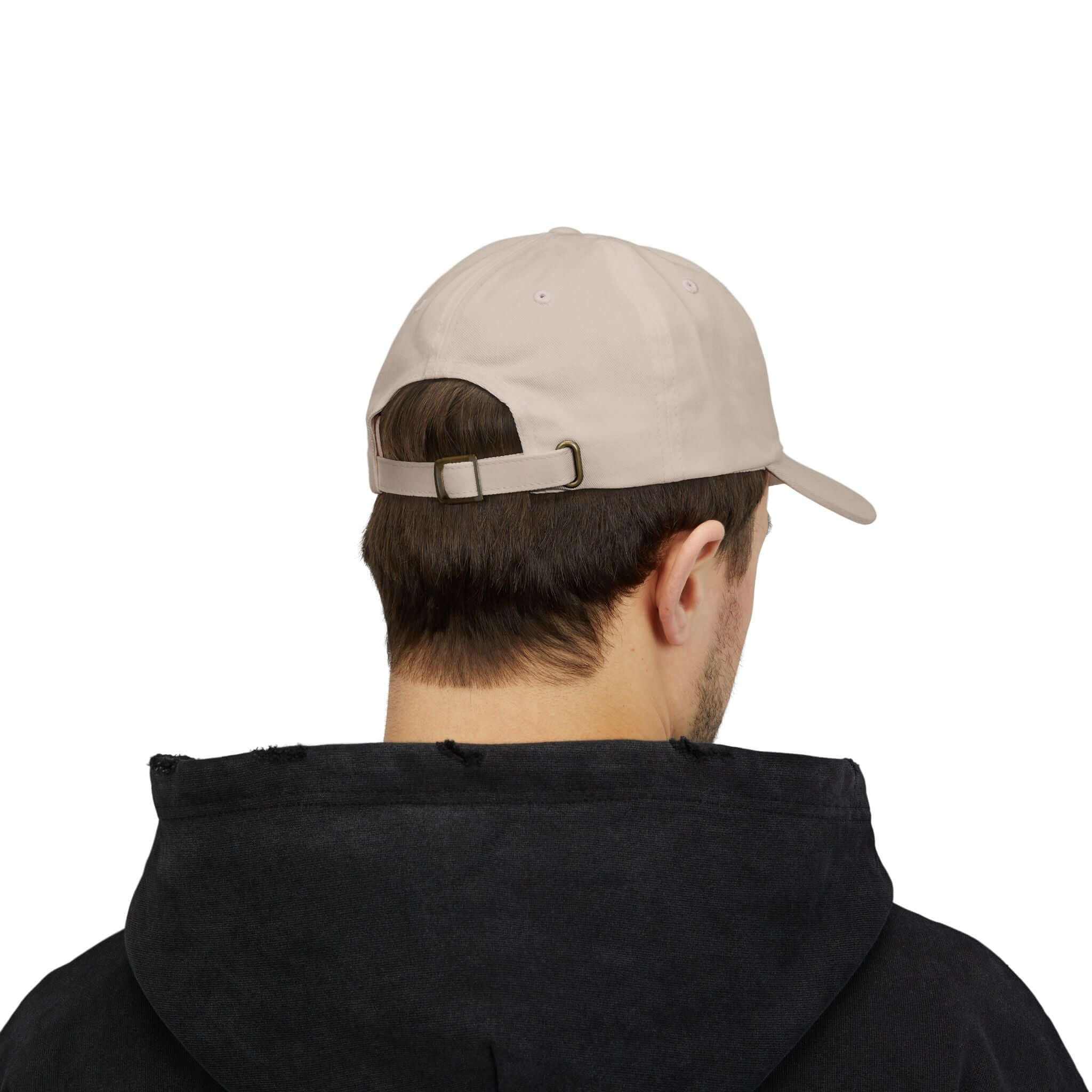 Rear view of person wearing the World's Greatest Player Classic Dad Cap in beige with adjustable strap, perfect for casual style.