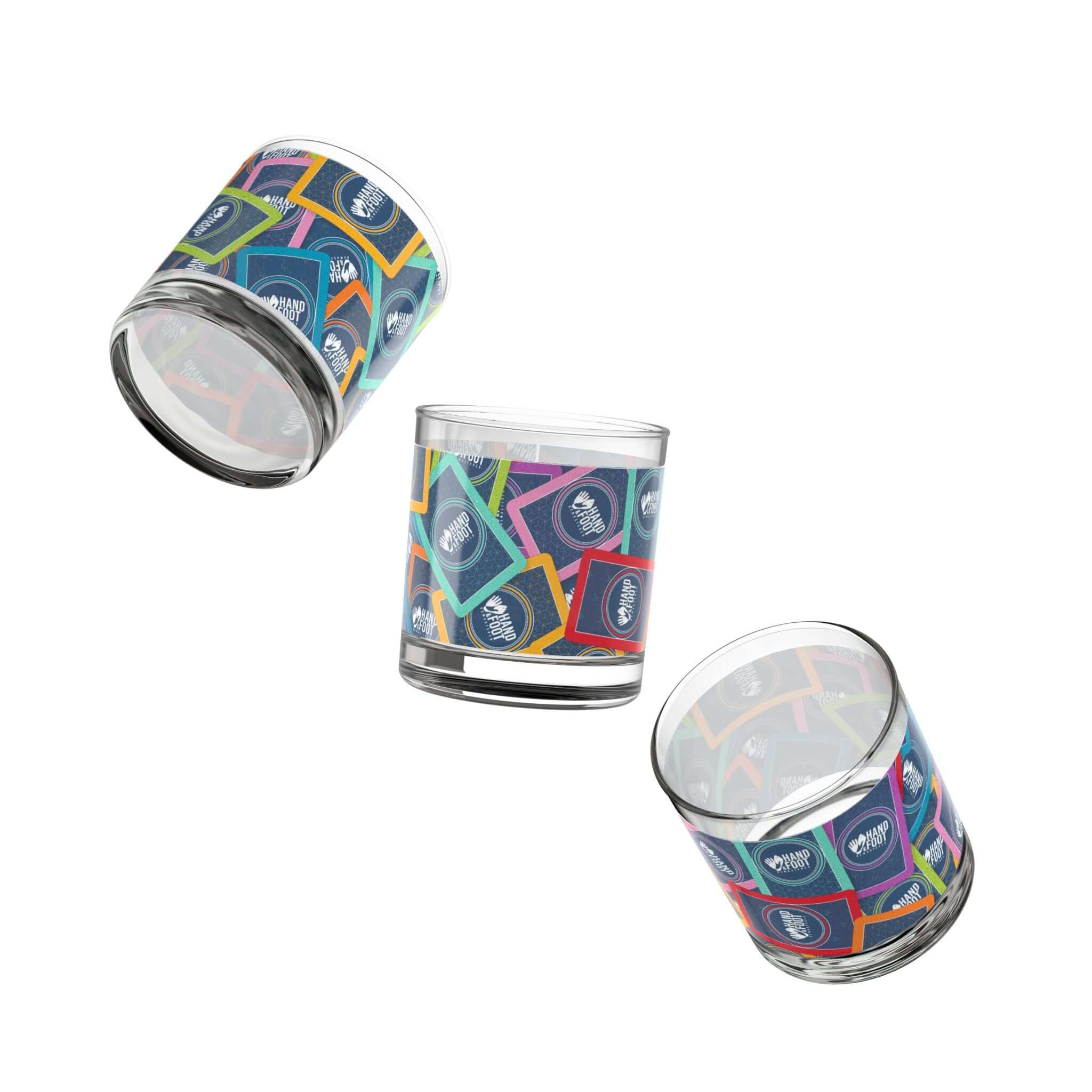 Set of three 10oz Hand & Foot Remastered Rocks Glasses with vibrant, wraparound prints, ideal for whiskey or cocktails.
