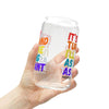 Hand holding a 16oz It's My Turn Sipper Glass with colorful text, adding vibrant style to your hydration routine.