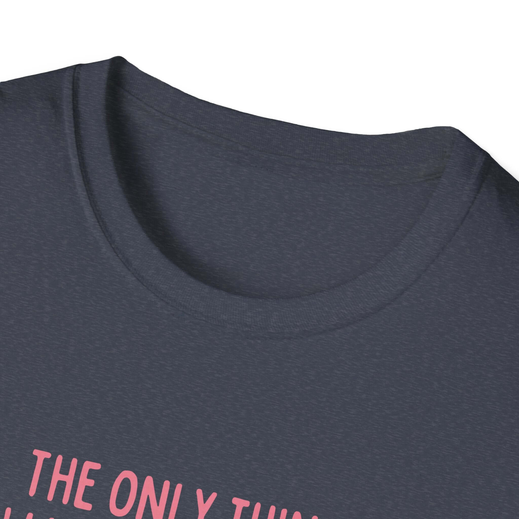 Close-up of Being a Mother Softstyle T-Shirt with text detail, showcasing comfortable fabric and elegant neckline.