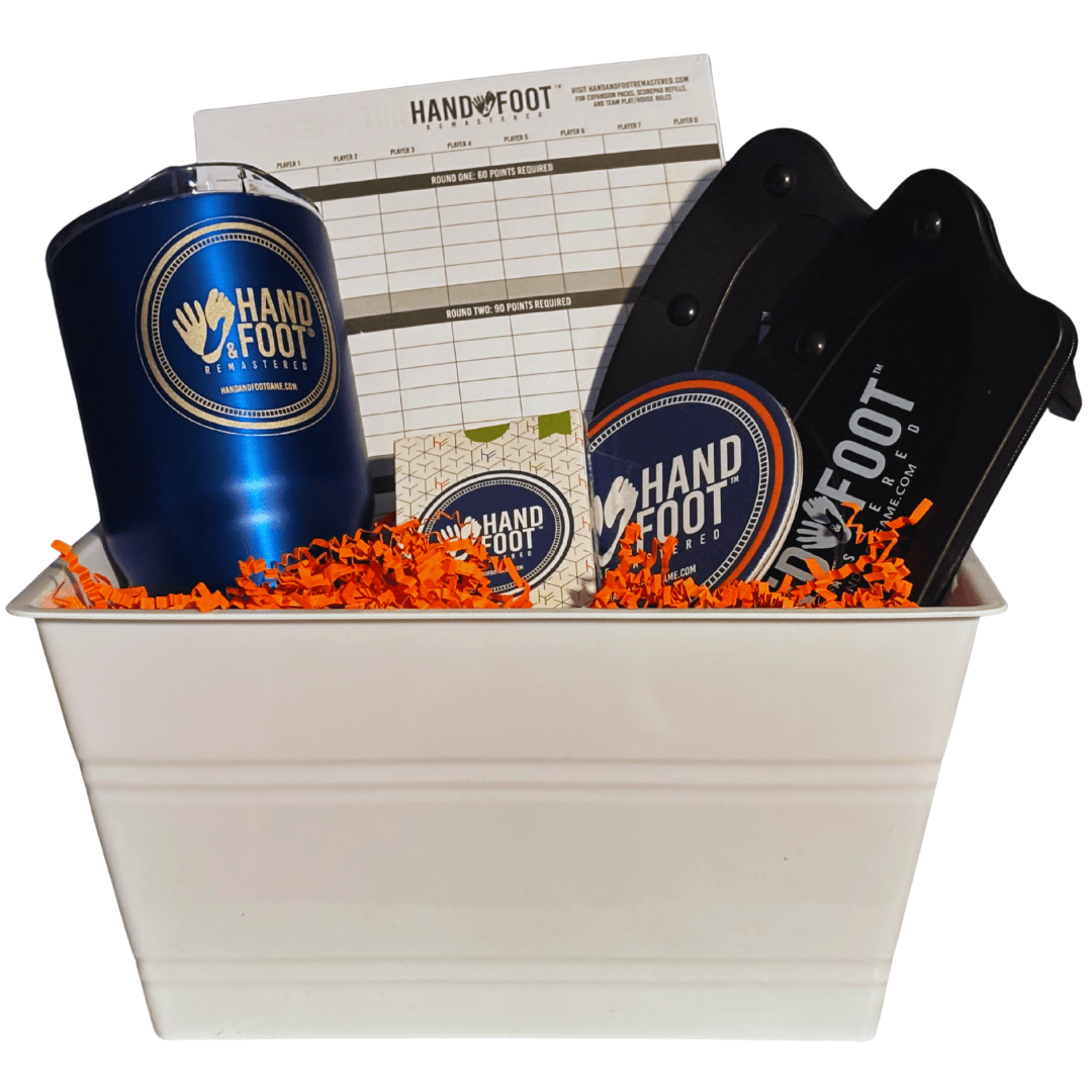 Limited-Edition Hand & Foot Remastered Accessory Set in white basket with score pad and branded accessories.