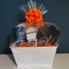 Limited-Edition Hand & Foot Remastered Accessory Set gift basket wrapped with bright orange bow, perfect for game enthusiasts.