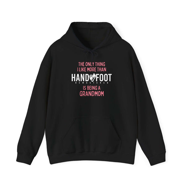 Black hooded sweatshirt with 'The only thing I like more than hand and foot is being a grandmom' printed in contrasting colors.