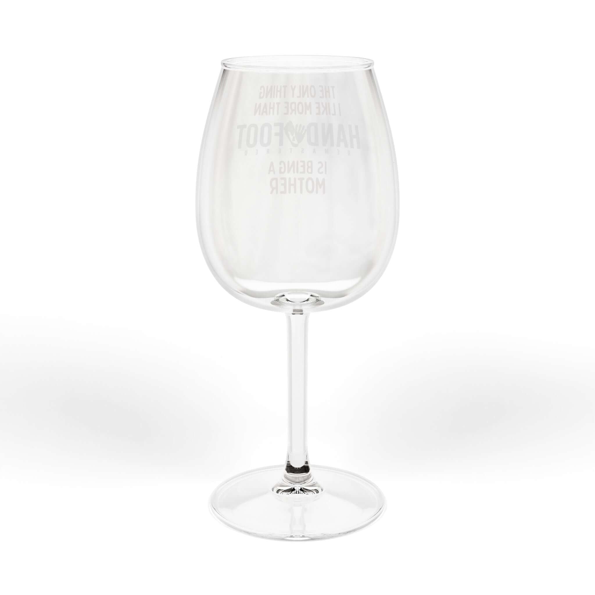 Being a Mother hand and foot wine glass with etched text highlighting motherhood on transparent glass.