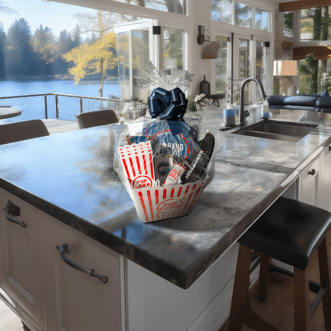 Hand & Foot Remastered Game Night Gift Set on kitchen counter with lake view in the background.
