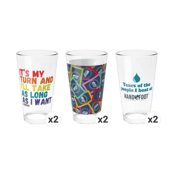 Hand & Foot Remastered Pint Glass Collection with unique designs: "It's My Turn," classic deck pattern, "Tears of the People I Beat."